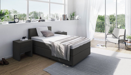 Boxspring Solo Plus - BoxspringPlace - Eenpersoons Boxspring. Hoge eenpersoons boxspring. Hoge instap 1 persoons boxspring. Boxspring 70x200. Boxspring 80x200. Boxspring 90x200. Boxspring compleet. Boxspring goedkoop. Goedkope boxspring. Boxspringset. Boxspring actie. Boxspring outlet